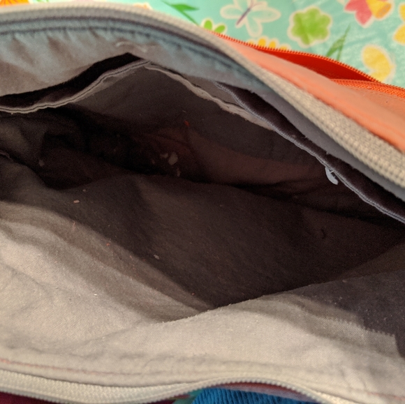 Salmon colored crossbody purse. - Picture 2 of 3